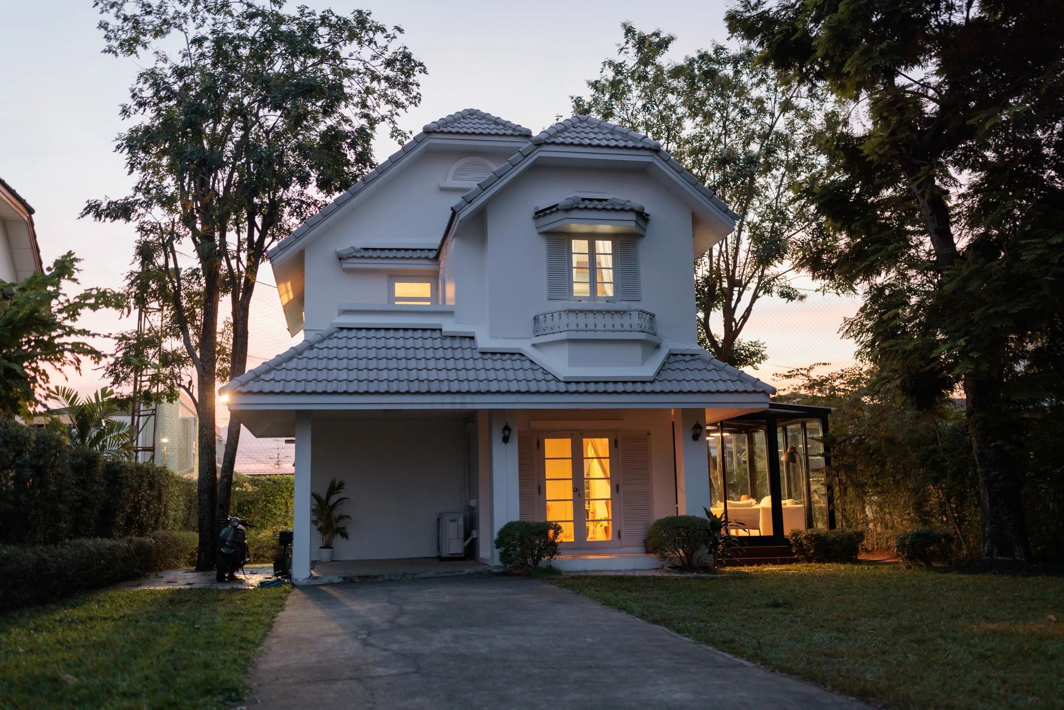 Well-kept home exterior at dusk