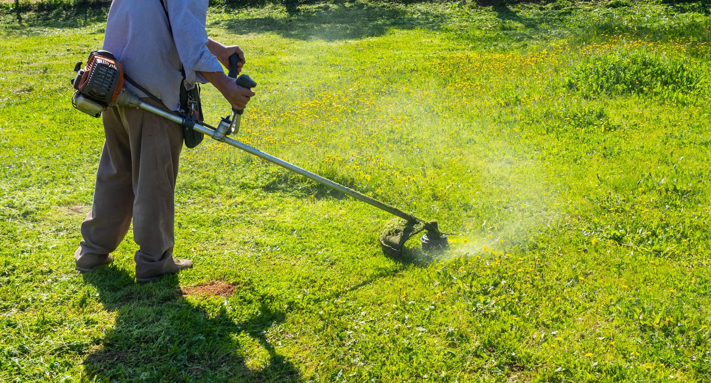 Edging grass with a string trimmer